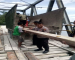 Pemerintah Lamban, TNI/Polri Masyarakat Perbaiki Jembatan Beli