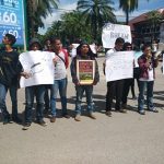 Aksi damai yang dilakukan puliuhan wartawan di Kota kendari Sultra yang mengecam terhadap tindak kekerasan terhadap wartawan. FOTO : FT