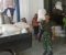 Anggota TNI Kodim Probolinggo Babinsa Ramil Koramil 0820/07 Wonomerto turut serta membantu petani mengantarkan hasil panen di Bulog. FOTO : AHMAD SUGENG LAKSONO