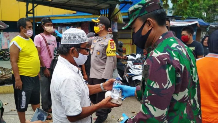 Sinergitas TNI/Polri di Palu Bantu Masyarakat Terdampak Covid-19