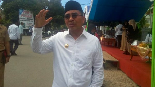 Bupati Butur Abu Hasan Hadiri Pesta Panen di Desa Waode Kalowo