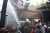 petugas kebakaran saat menjinakkan kobaran api yang membakar gudang kotak buha di Welahan. FOTO : DSW