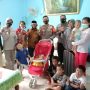 Kapolres Baubau Foto Bersama Usai Serahkan Donasu Pengobatan Fazrin