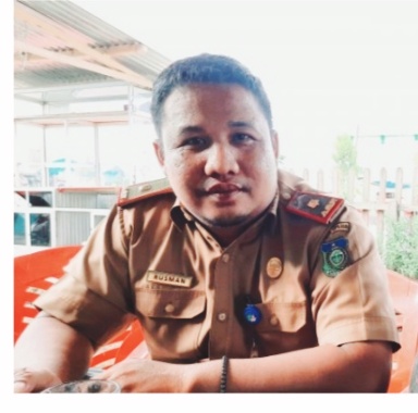 Kepala bidang (Kabid) Pemerintahan Desa dan Kebersihan Kota DPMD, Rusman