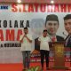 Foto Saat Balon Bupati Kolaka Amri didamping Husmaluddin memberi sambutan di depan tim relawan