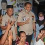 Pasangan Rapi saat bersama pendukungnya
