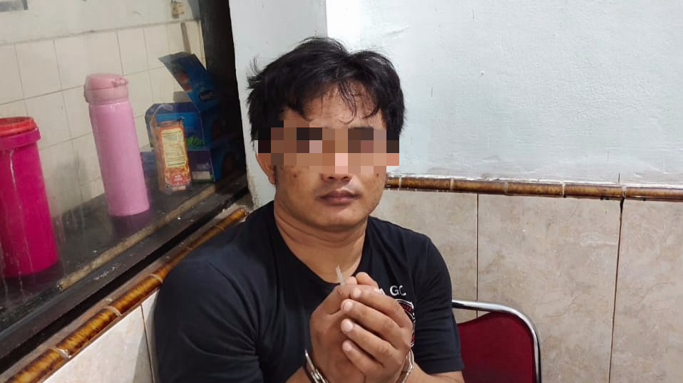 Tersangka Warid