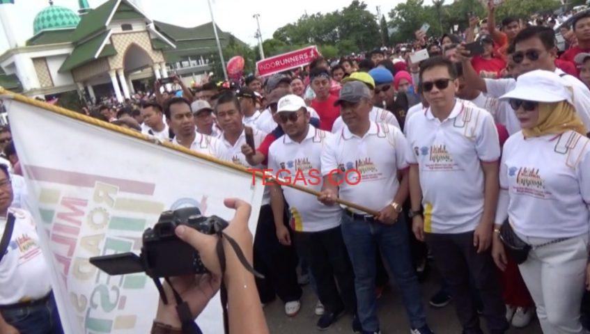 Kapolda Sultra Lepas Ribuan Warga Peserta Jalan Santai di Acara Milenial﻿