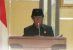 Tasman lamuese saat membacakan pemandangan umum gabungan fraksi di Sidang istimewah DPRD Konsel. FOTO : MAHIDIN